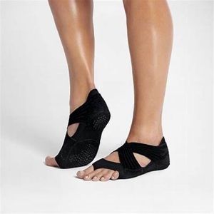 Two Pairs of Nike Studio Wraps, size small (6.5-7.5)